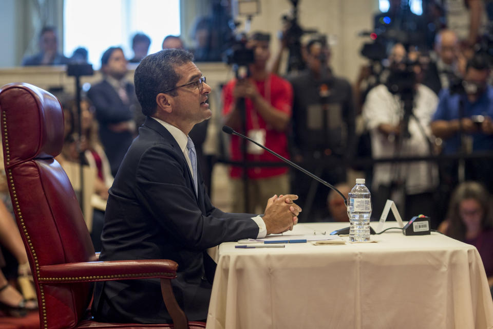 Proposed Secretary of State Pedro Pierluisi speaks during his confirmation hearing at the House of Representatives, in San Juan, Puerto Rico, Friday, August 2, 2019. As Gov. Ricardo Rossello is expected to leave office in a few hours, the Puerto Rican House of Representatives is expected to vote on Pierluisi's confirmation Friday afternoon. If he is rejected, Justice Secretary Wanda Vazquez automatically becomes governor as the next in the order of succession, even though she has said she would unwillingly accept the job. (AP Photo/Dennis M. Rivera Pichardo)