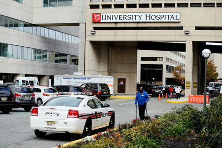 A police car is seen near the entrance of University Hospital where Ahmad Khan Rahimi, who is accused of multiple bombings last month in New York and New Jersey, has been recovering from gunshot wounds he suffered in a shootout with police before his arrest, in New Jersey, U.S., October 13, 2016. REUTERS/Eduardo Munoz