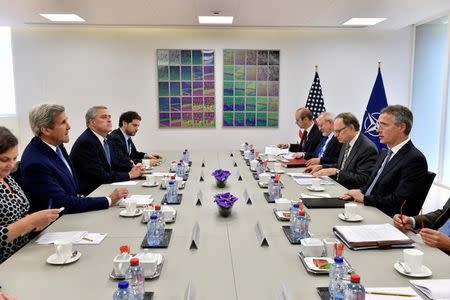 U.S. Secretary of State John Kerry (2nd L) meets with NATO Secretary-General Jens Stoltenberg (R) at the NATO headquarters in Brussels, June 27, 2016. REUTERS/Eric Vidal
