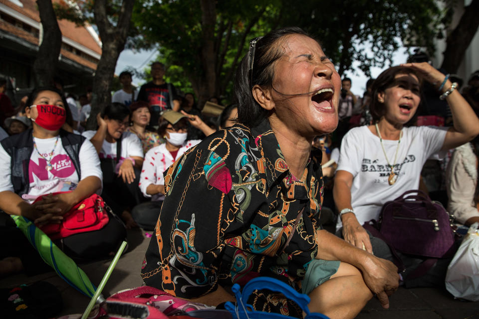 <p>Thai protesters take part in a rare display of open resistance during an anti-coup anniversary protest on May 22, 2016 in Bangkok, Thailand. Around a few hundred protesters took part as the police stood by peacefully. (Paula Bronstein/Getty Images) </p>