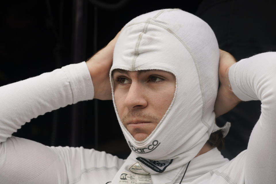 FILE - Colton Herta prepares to drive during a practice session for the IndyCar auto race at Indianapolis Motor Speedway, Friday, Aug. 13, 2021, in Indianapolis. The IndyCar Series opens its season this weekend on the downtown streets of St. Petersburg, Florida. Colton Herta is the defending race winner. IndyCar is on a high as it begins its season with young talent capable of carrying the series into the future. But Herta is again in the mix of Formula One conversations and Pato O’Ward already has one foot out the door. (AP Photo/Darron Cummings, File)