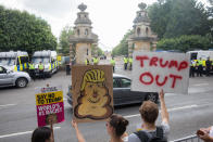 <p>Protesters gather at the gates of Blenheim Palace where President Trump is due to visit for dinner on July 12, 2018, in Oxfordshire, England. (Photo: Matt Cardy/Getty Images) </p>
