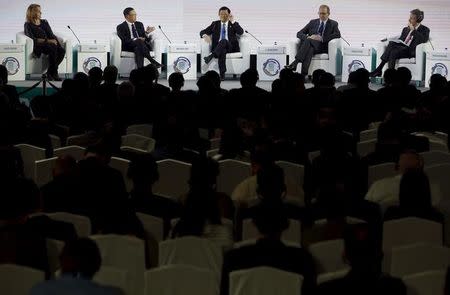 Vietnam's President Truong Tan Sang (C) speaks at a panel discussion with (L-R) Asia Society President Josette Sheeran, Blackberry's CEO John Chen, Merck Biopharma China's CEO and President E. Allan Gabor and Prudential Corporation Asia's Chairman Donald Kanak during the Asia-Pacific Economic Cooperation (APEC) CEO summit in the capital city of Manila, Philippines November 17, 2015. REUTERS/Edgar Su