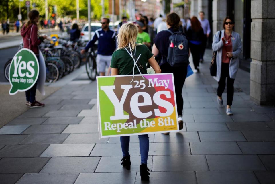 A woman campaigns for the Yes vote in Dublin (REUTERS)