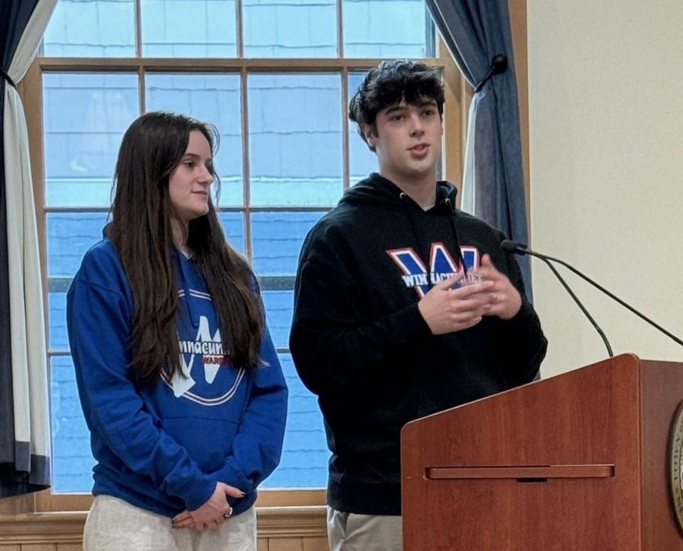 Winnacunnet High School seniors Chloe Marx and Kaleb Joiner speak at North Hampton's Select Board meeting.