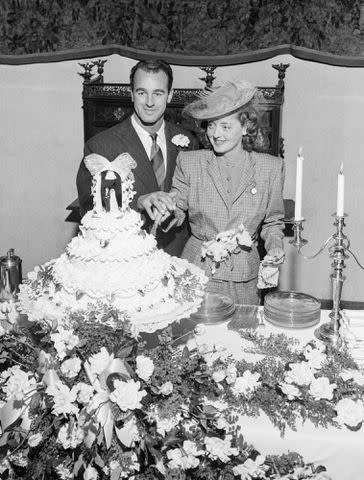 <p>Bettmann Archive</p> Bette Davis and William Grant Sherry