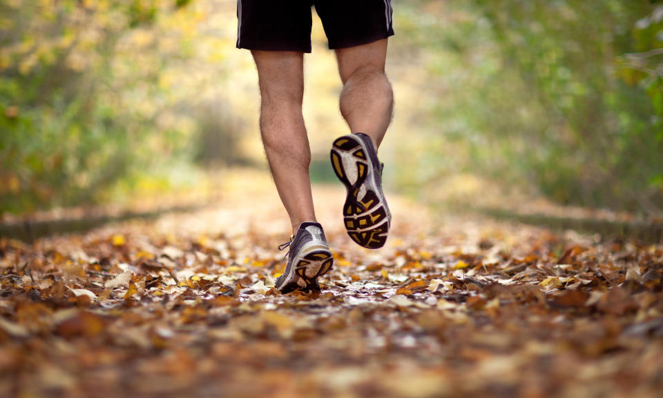 Man running on leaves. (Getty Images)