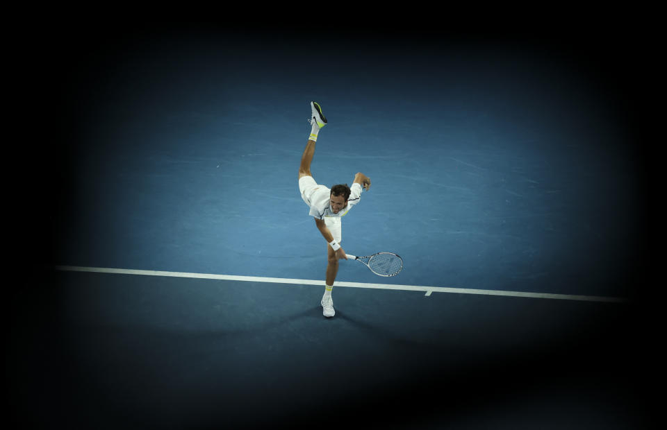 Russia's Daniil Medvedev serves to Greece's Stefanos Tsitsipas during their semifinal match at the Australian Open tennis championship in Melbourne, Australia, Friday, Feb. 19, 2021.(AP Photo/Hamish Blair)