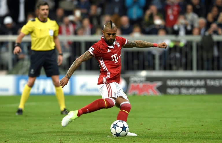 Bayern Munich's midfielder Arturo Vidal kicks a penalty during the UEFA Champions League 1st leg quarter-final football match against Real Madrid in Munich, southen Germany on April 12, 2017