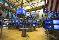 This photo provided by the New York Stock Exchange shows the unoccupied NYSE trading floor, closed temporarily for the first time in 228 years as a result of coronavirus concerns, Tuesday March 24, 2020. (Kearney Ferguson/NYSE via AP)