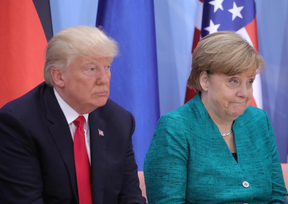 U.S. President Donald Trump and German Chancellor Angela Merkel attend the Women’s Entrepreneurship Finance event during the G20 leaders summit in Hamburg, Germany July 8, 2017. REUTERS/Michael Kappeler, Pool