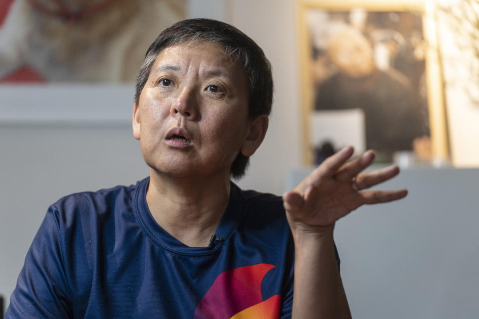 Lisa Lam, co-chair of Gay Games, speaks during an interview in Hong Kong, Tuesday, Oct. 31, 2023. Set to launch on Friday, Nov. 3, 2023, the first Gay Games in Asia are fostering hopes for wider LGBTQ+ inclusion in the Asian financial hub. (AP Photo/Chan Long Hei)