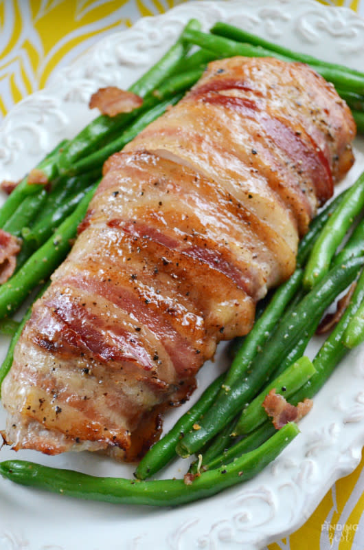 <p>Finding Zest</p><p>See how easy it is to make this delicious bacon-wrapped pork tenderloin for Easter dinner or any time of year. This a great alternative to ham!</p><p><strong>Get the recipe: <a href="http://www.findingzest.com/bacon-wrapped-pork-tenderloin-for-easter-dinner-giveaway-kraftrecipes.html" rel="nofollow noopener" target="_blank" data-ylk="slk:Bacon-Wrapped Pork Tenderloin;elm:context_link;itc:0;sec:content-canvas" class="link ">Bacon-Wrapped Pork Tenderloin</a></strong></p>