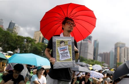 Anti-extradition bill protesters attend a demonstration in Victoria Park in Hong Kong