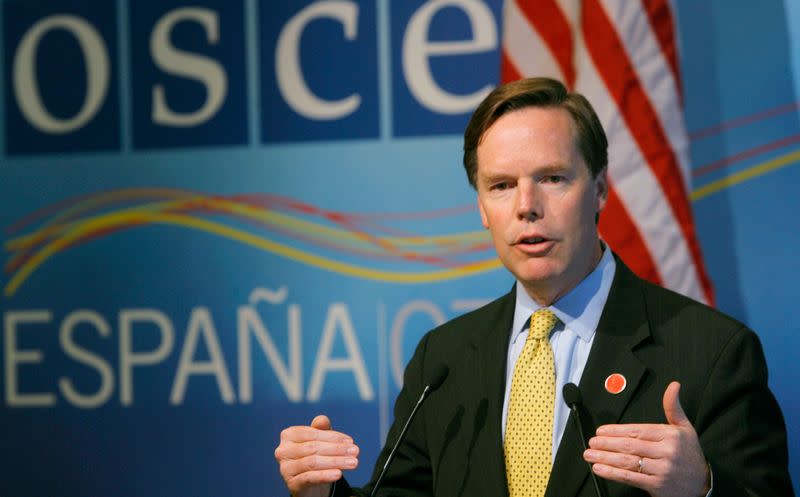 Burns, U.S. Undersecretary for Political Affairs, gestures during a news conference at the end of the OSCE ministerial meeting in Madrid