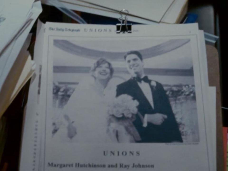 wedding announcement on iris' desk in the holiday