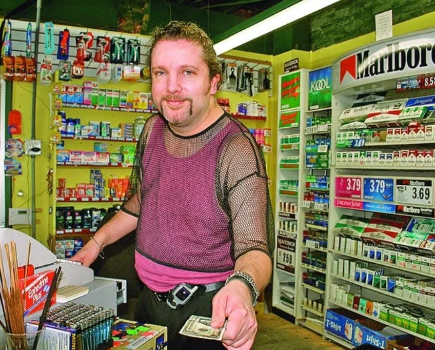 Curtis Thompson, seen here in 2006, has worked at the Village Market in downtown Wilmington since 1997.