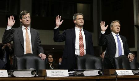 (L-R) Credit Suisse officials CEO Brady Dougan, Robert Shafir and Hans Urlich-Mesiter are sworn in before the Senate Homeland and Governmental Affairs Investigations Subcommittee on Capitol Hill in Washington February 26, 2014. REUTERS/Gary Cameron