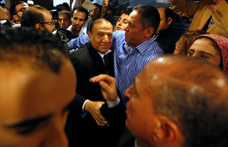 FILE PHOTO: Egypt's former army chief of staff Sami Anan, leaves the news conference at his office in Cairo, March 13, 2014. REUTERS/Mohamed Abd El Ghany/File Photo