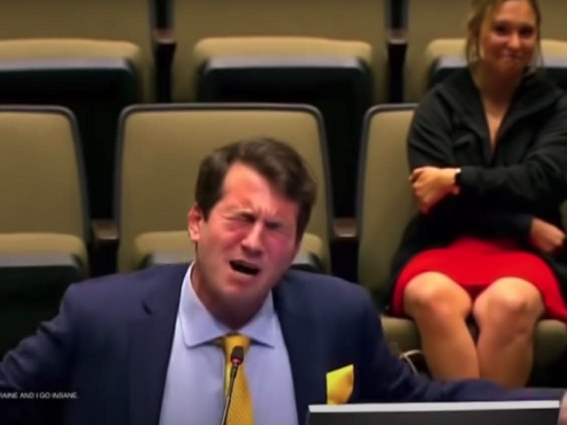 A screengrab of comedian Alex Stein's rap performance at the Plano City Council