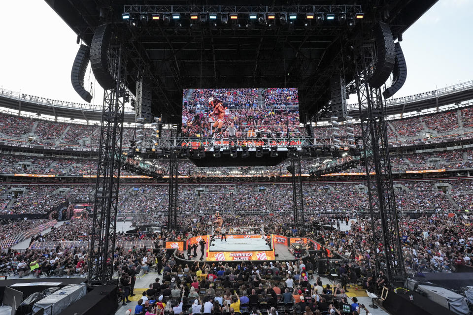 CLEVELAND, OHIO - AUGUST 03: LA Knight hits Logan Paul with a suplex off the top rop during SummerSlam at Cleveland Browns Stadium on August 3, 2024 in Cleveland, Ohio. (Photo by WWE/Getty Images)