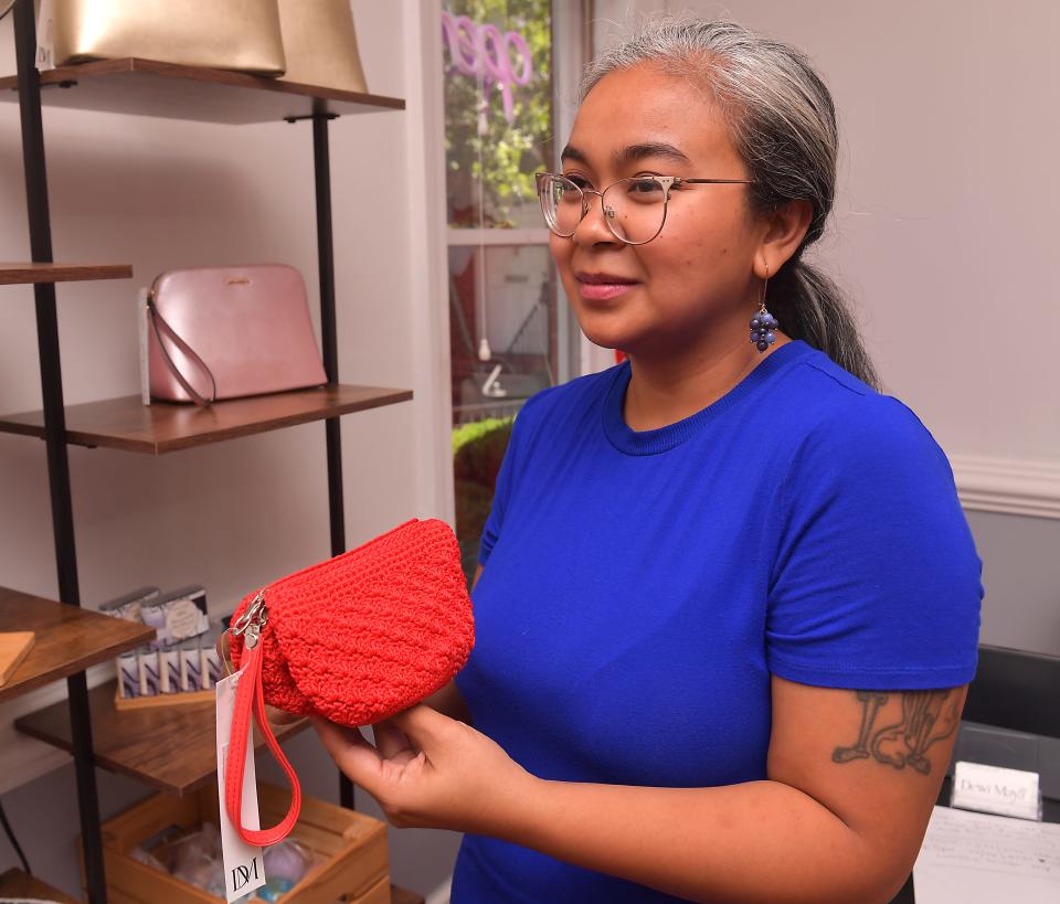 xDewi Mayasari is the owner and designer behind Dewi Maya, a new designer handbag and jewelry shop in Spartanburg.  Here, she talks about some of the handbags she has designed that are for sale in her shop.