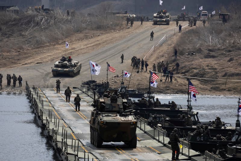 FILE PHOTO: South Korean and US soldiers conduct a joint river-crossing exercise in Yeoncheon