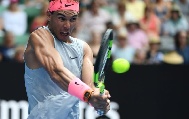 Spain's Rafael Nadal hits a return against Argentina's Diego Schwartzman during their men's singles match on day seven of the Australian Open in Melbourne on January 21, 2018