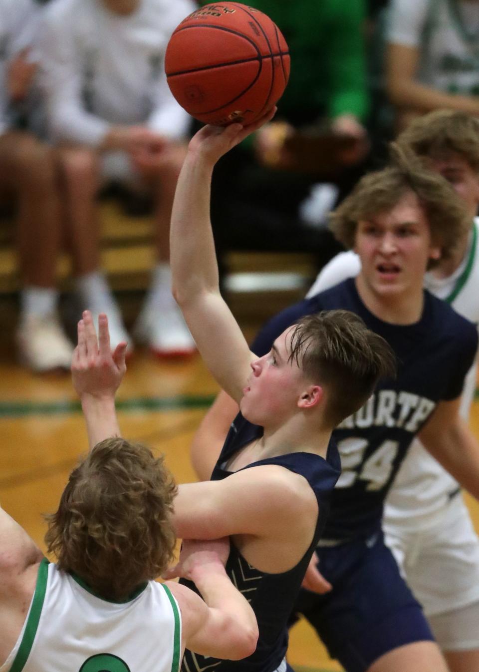 Appleton North's Will Sweeney goes up for a shot against Oshkosh North on Jan. 30. The Lightning is a game behind Oshkosh North in the Fox Valley Association title chase.