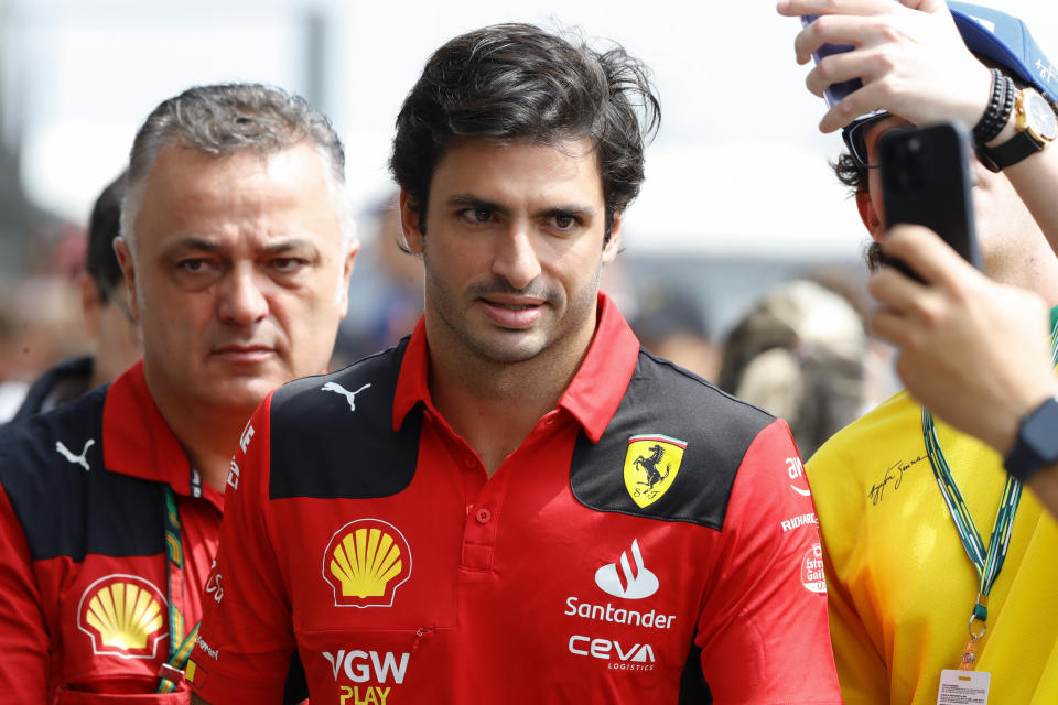 Ferrari driver Carlos Sainz, of Spain, arrives for a practice session for the Brazilian Formula One Grand Prix at the Interlagos race track in Sao Paulo, Brazil, Friday, Nov. 3, 2023. (AP Photo/Marcelo Chello)