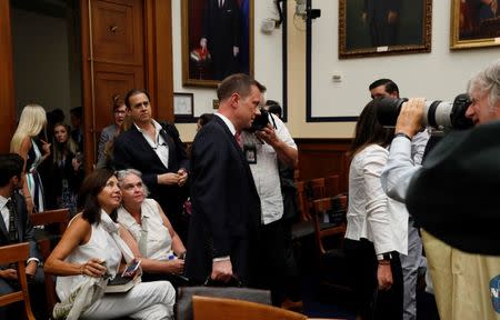 FBI Deputy Assistant Director Peter Strzok departs during a recess in his testimony before the House Committees on Judiciary and Oversight and Government Reform joint hearing on "Oversight of FBI and DOJ Actions Surrounding the 2016 Election" in the Rayburn House Office Building in Washington, U.S., July 12, 2018. REUTERS/Leah Millis