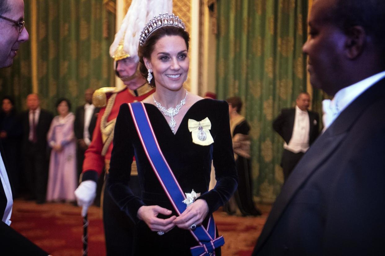 royals attend a reception for the diplomatic corps at buckingham palace