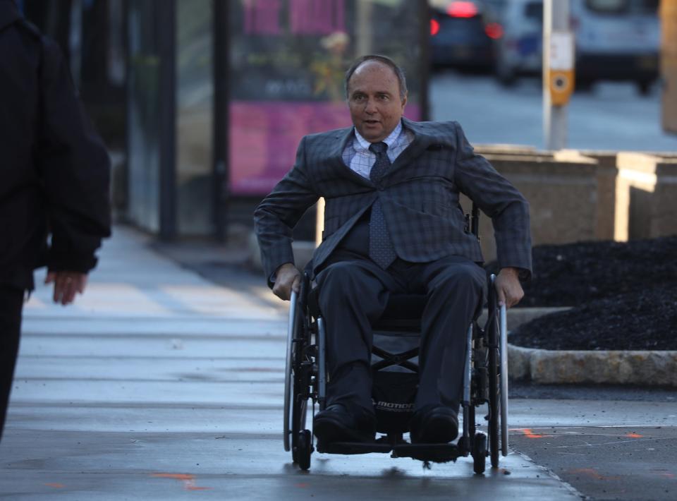 Robert Morgan heads into federal court in Rochester, April 12, 2022 for his guilty plea.