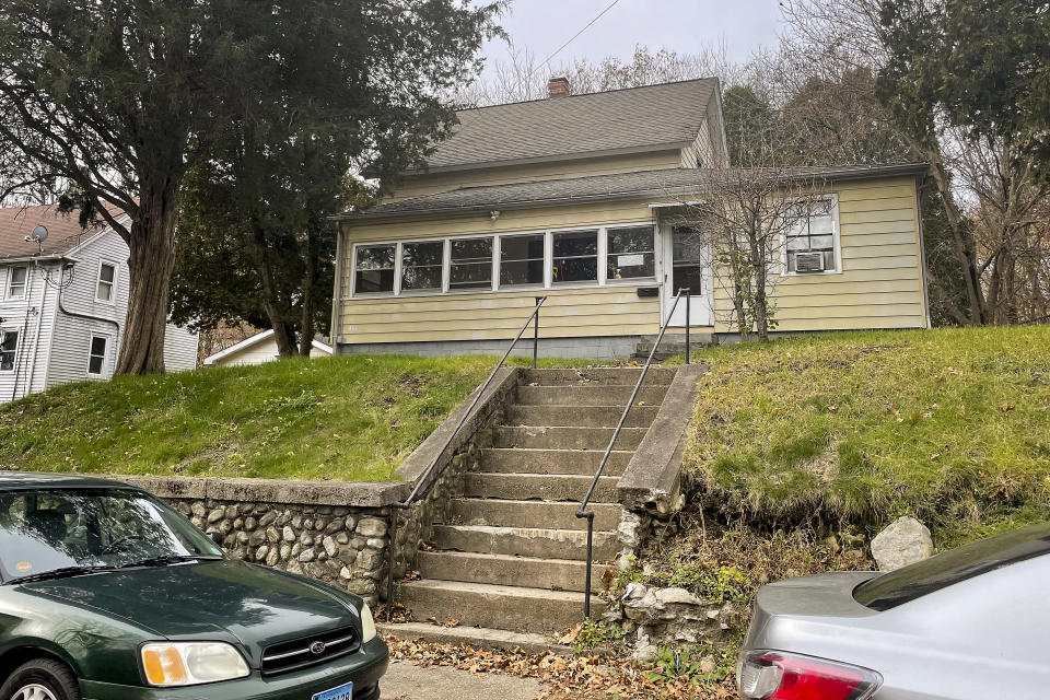 FILE - Reach House, a halfway house for sex offenders where visiting nurse Joyce Grayson was found dead, sits atop a small hill, Nov. 21, 2023, in Willimantic, Conn. The husband of the visiting nurse who was killed during an appointment with a convicted rapist filed a wrongful death lawsuit Monday, May 6, 2024 alleging her employer repeatedly ignored workers' safety concerns about treating some patients with mental illness and violent pasts. (AP Photo/Pat Eaton Robb, File)