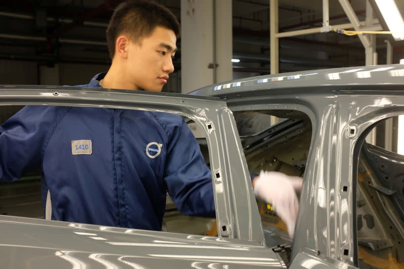 Worker is seen on a production line for Polestar, Volvo and Lynk&Co vehicles at a Geely plant in Taizhou