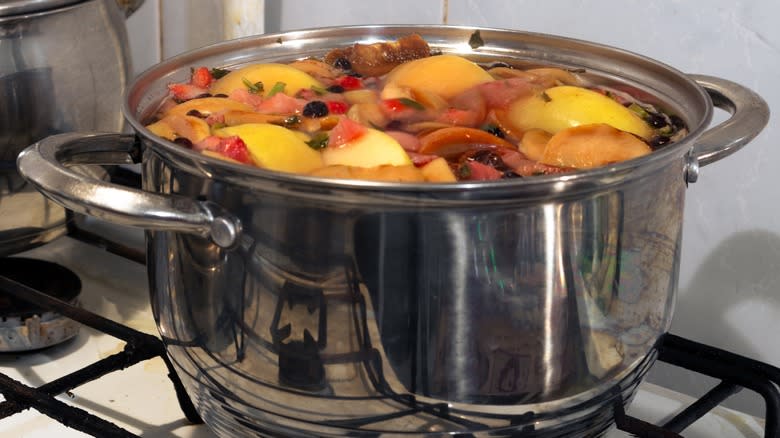 Fruit compote cooking on stove