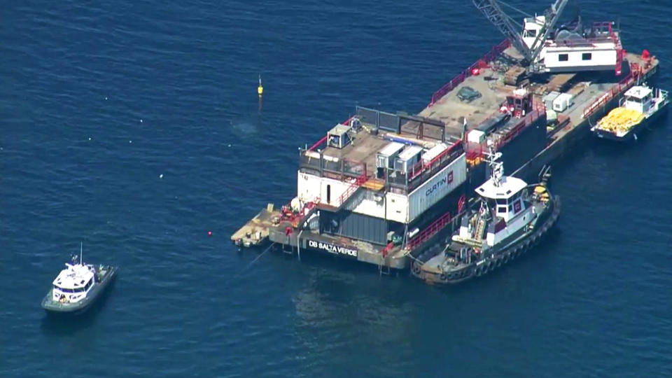 This photo from video provided by KABC-TV shows divers resuming their search for the final missing victim who perished in a boat fire off the Southern California coast Wednesday, Sept. 11, 2019. The victim is one of 34 who died at sea last week near Santa Cruz Island when the dive boat Conception burned and sank on Sept. 2. Santa Barbara County Sheriff's Lt. Erik Raney says salvage efforts to recover the Conception also resumed Wednesday. (KABC-TV via AP)
