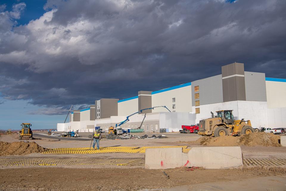 Construction continues at a new Amazon fulfillment center on the corner of Larimer County Road 30 and Interstate 25 near the Northern Colorado Regional Airport in Loveland on Monday. The facility will be more than 600,000 square feet.