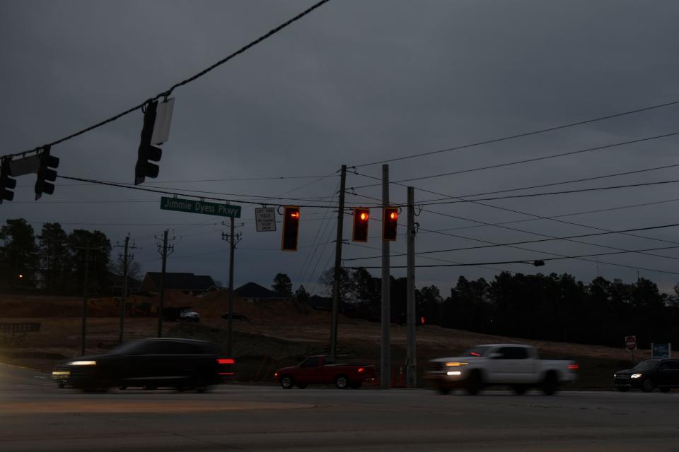 Cars approach the intersection of Jimmie Dyess Parkway and Harper-Franklin Avenue on Wednesday, Jan. 3, 2024.