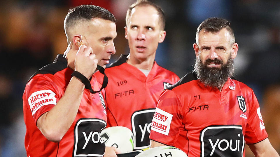 Referees Matt Cecchin and Gavin Badger, pictured here during a game in 2019.