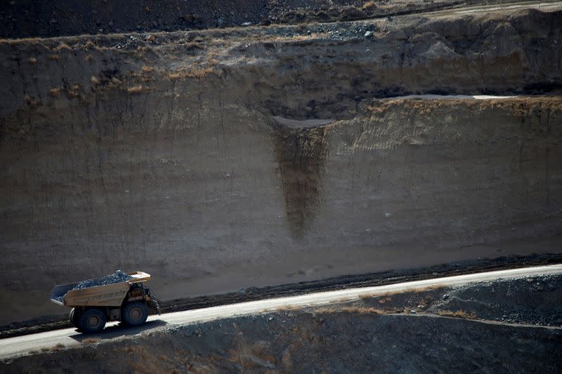 FILE PHOTO: A mining truck takes ore from the open-pit mine at the MP Materials rare earth mine in Mountain Pass