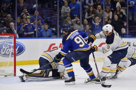 Dec 10, 2017; St. Louis, MO, USA; St. Louis Blues right wing Vladimir Tarasenko (91) shoots and scores against Buffalo Sabres goalie Robin Lehner (40) during overtime at Scottrade Center. Mandatory Credit: Jeff Curry-USA TODAY Sports