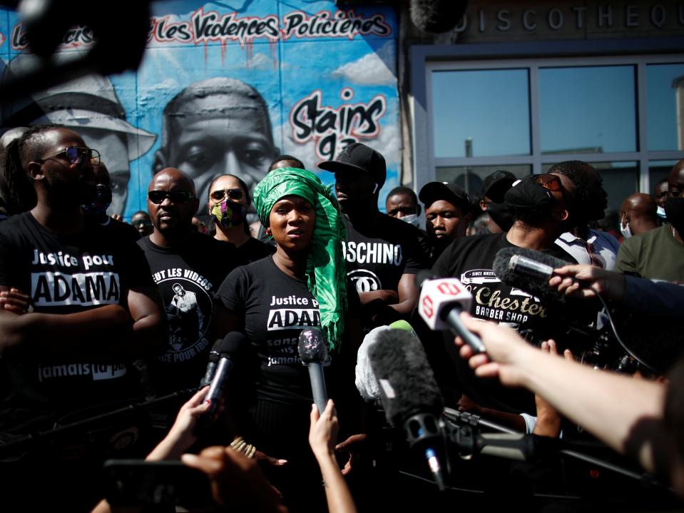 <p>Journalists listen to Assa Traore, sister of Adama Traore, a 24-year-old Black Frenchman who died in a 2016 police operation.</p> (REUTERS)