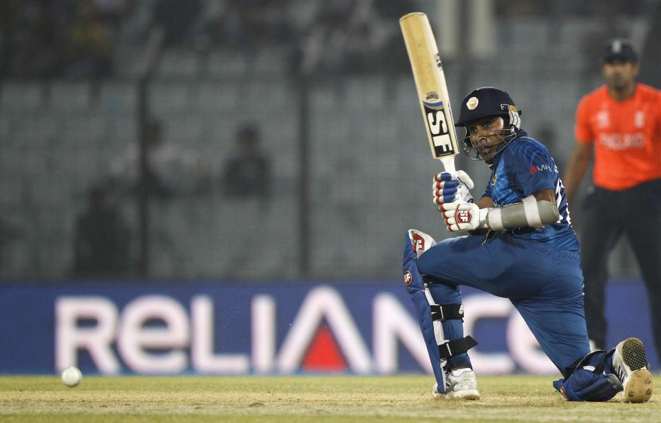 Sri Lanka's Mahela Jayawardena plays a shot during an ICC Twenty20 Cricket World Cup match against England in Chittagong, Bangladesh, Thursday, March 27, 2014. (AP Photo/A.M. Ahad)