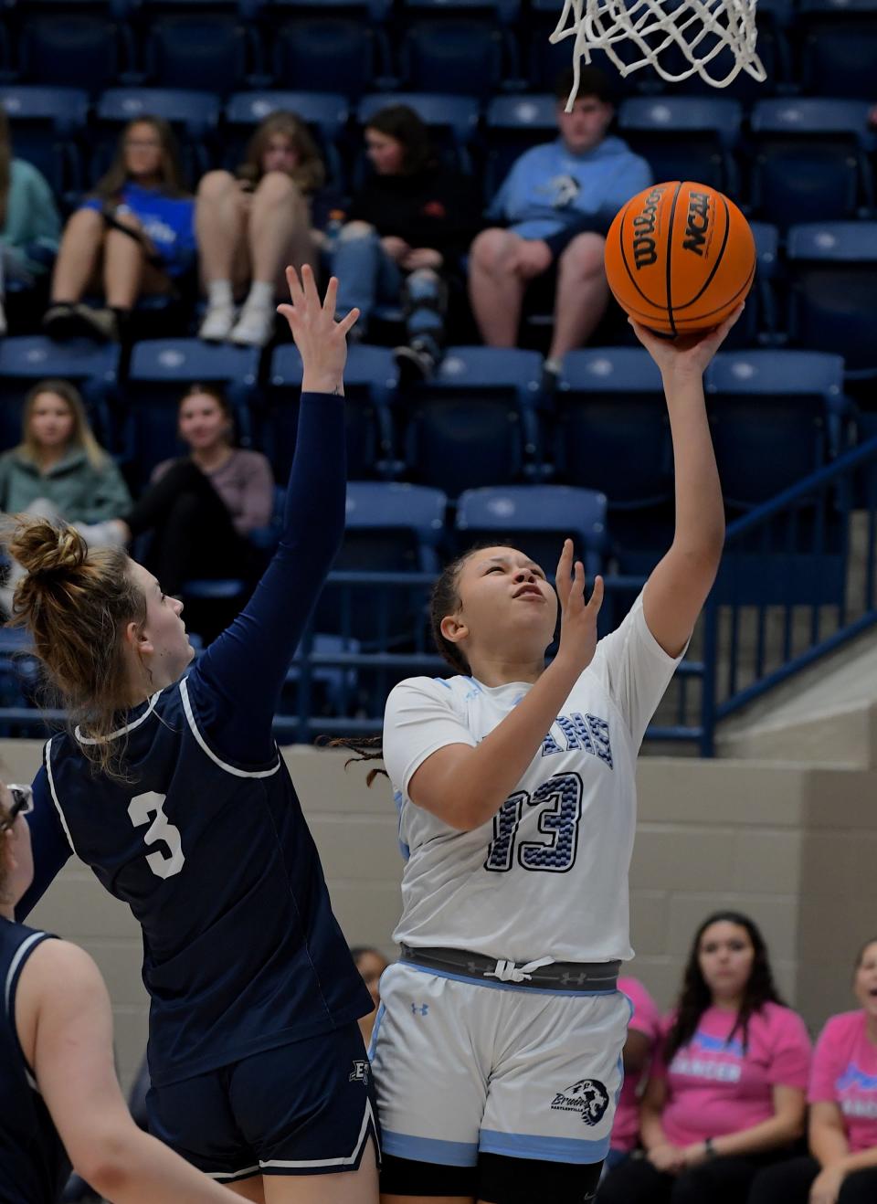 Bartlesville High School's Mikka Chambers (13) scores against Enid during basketball action in Bartlesville on Feb. 2, 2024.