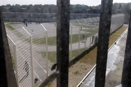 General view of the walking inner courtyard of the men's building inside the Fleury-Merogis prison, near Paris, is seen in this May 14, 2014 file picture. REUTERS/Charles Platiau