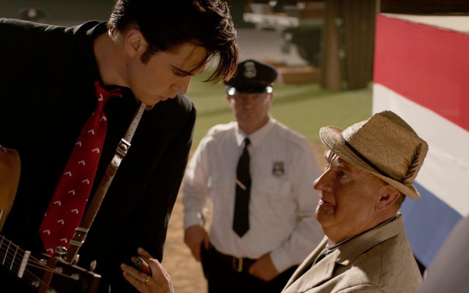 Conned: Austin Butler and Tom Hanks in Elvis - Warner Bros. Pictures via AP