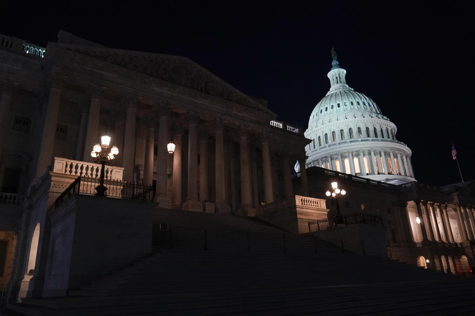 Lights illuminate the capitol after House Speaker Kevin McCarthy of Calif., announced that he and President Joe Biden had reached an "agreement in principle" to resolve the looming debt crisis on Saturday, May 27, 2023, on Capitol Hill in Washington. (AP Photo/Patrick Semansky)