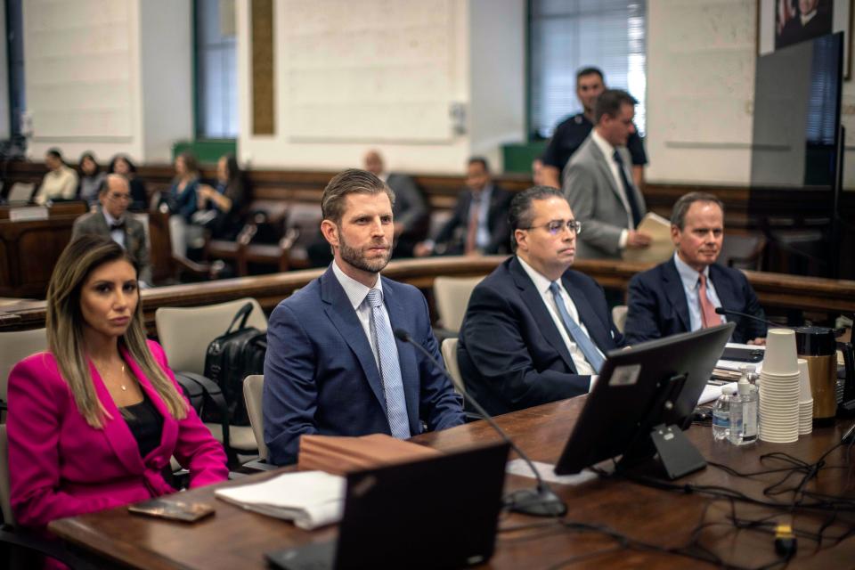 Eric Trump (2L) sits in the courtroom alongside his attorneys (L-R) Alina Habba, Clifford Robert, and Christopher Kise (Getty Images)