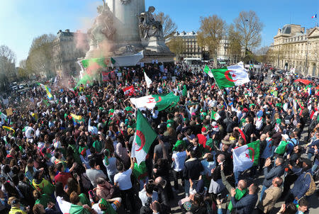 Protestors of the Algerian community of Paris attend a demonstration against President Abdelaziz Bouteflika on the Place de la Republique in Paris, France, March 31, 2019. REUTERS/Charles Platiau